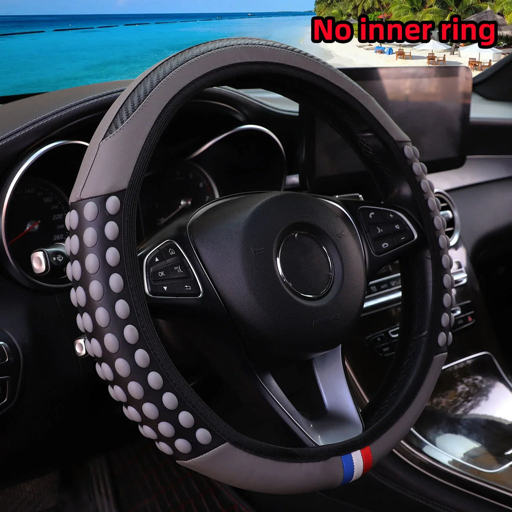 Carbon silicone massage steering wheel cover with textured grip for better control and comfort while driving. Durable, stylish, and designed to fit 14.5–15 inch wheels without an inner ring. 🚗✨