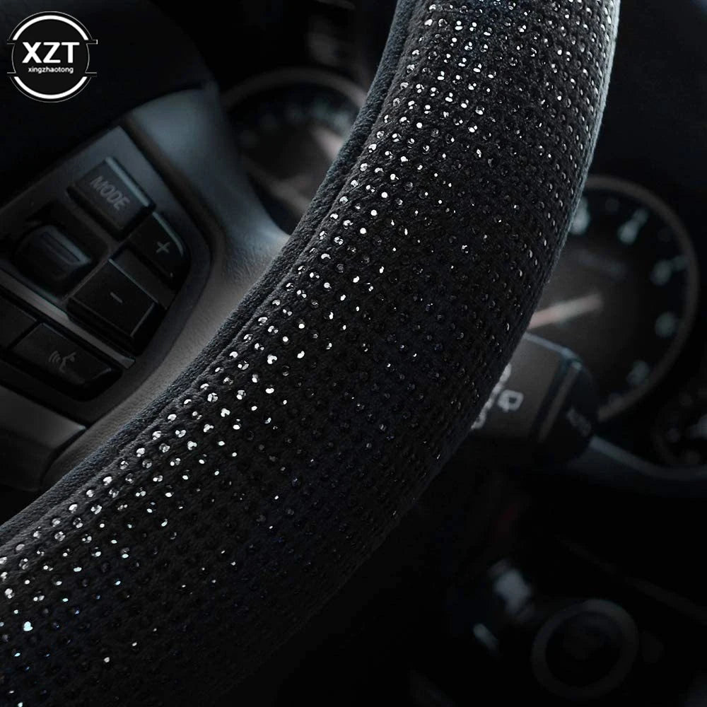 Add a touch of luxury to your drive with this rhinestone steering wheel cover, featuring sparkling crystal diamonds for a stylish and elegant look. Breathable, anti-slip, and designed for a secure fit on 38CM wheels. 🚗💎